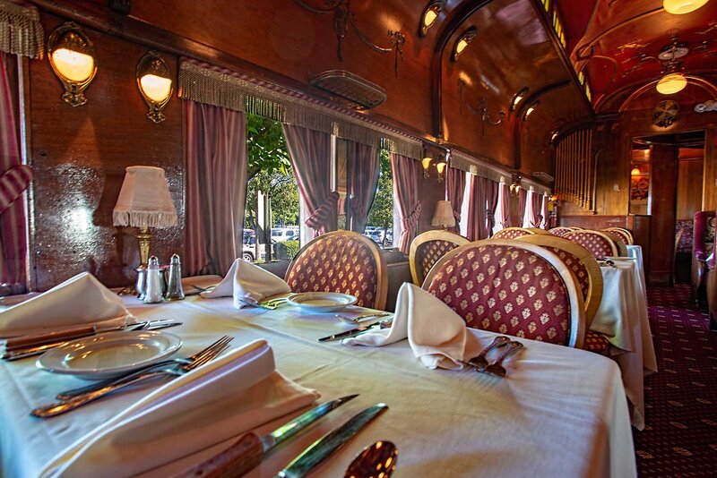 Train car dining room with view of set table for four